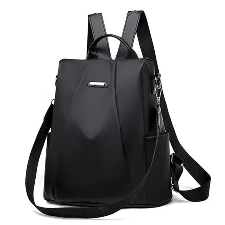 Women's lightweight water-resistant nylon backpack. Multi-way carry for versatile everyday & travel use.