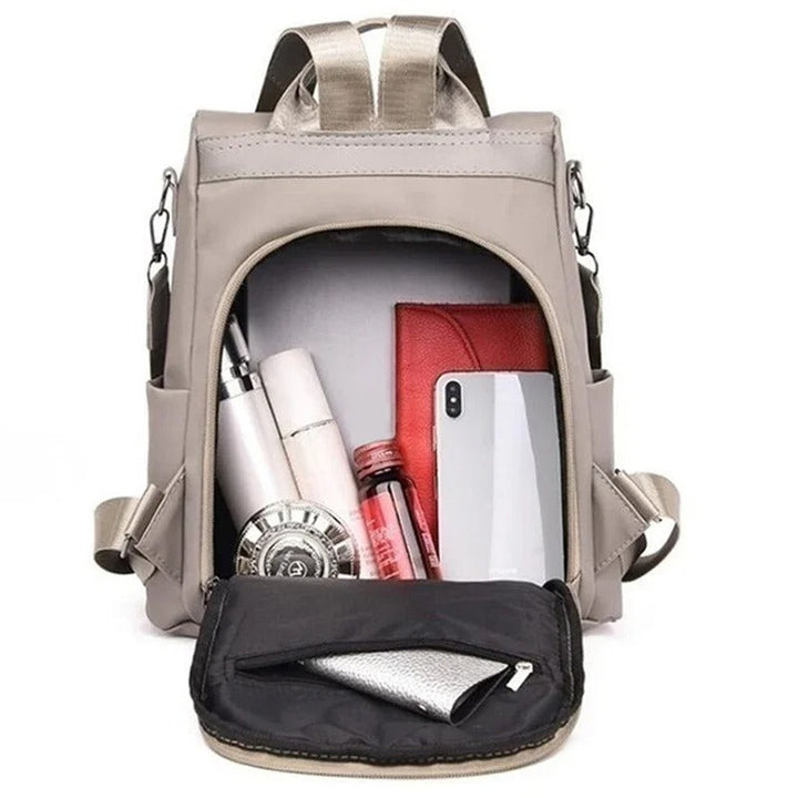 Women's lightweight nylon bag worn as a chic crossbody, perfect for daily errands & travel, water-resistant.