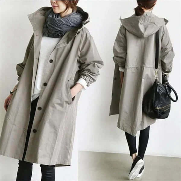 Fashionable women's waterproof rain cape. Lightweight outerwear offering essential all-weather protection.