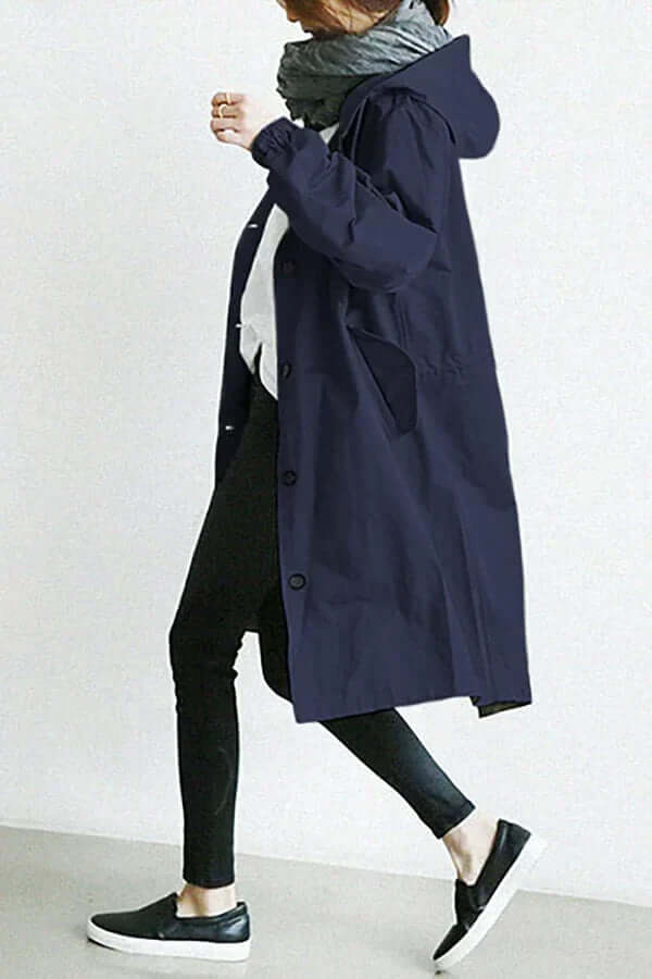 Chic women's waterproof rain cape. Lightweight design, perfect for stylish protection in any weather.