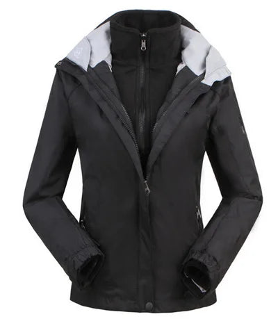 Woman wearing a pink lightweight waterproof windbreaker jacket, showcasing its comfortable fit and design.