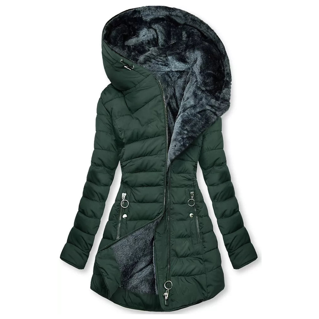 Close-up of waterproof fabric on a women's winter outdoor coat with hood, durable design.