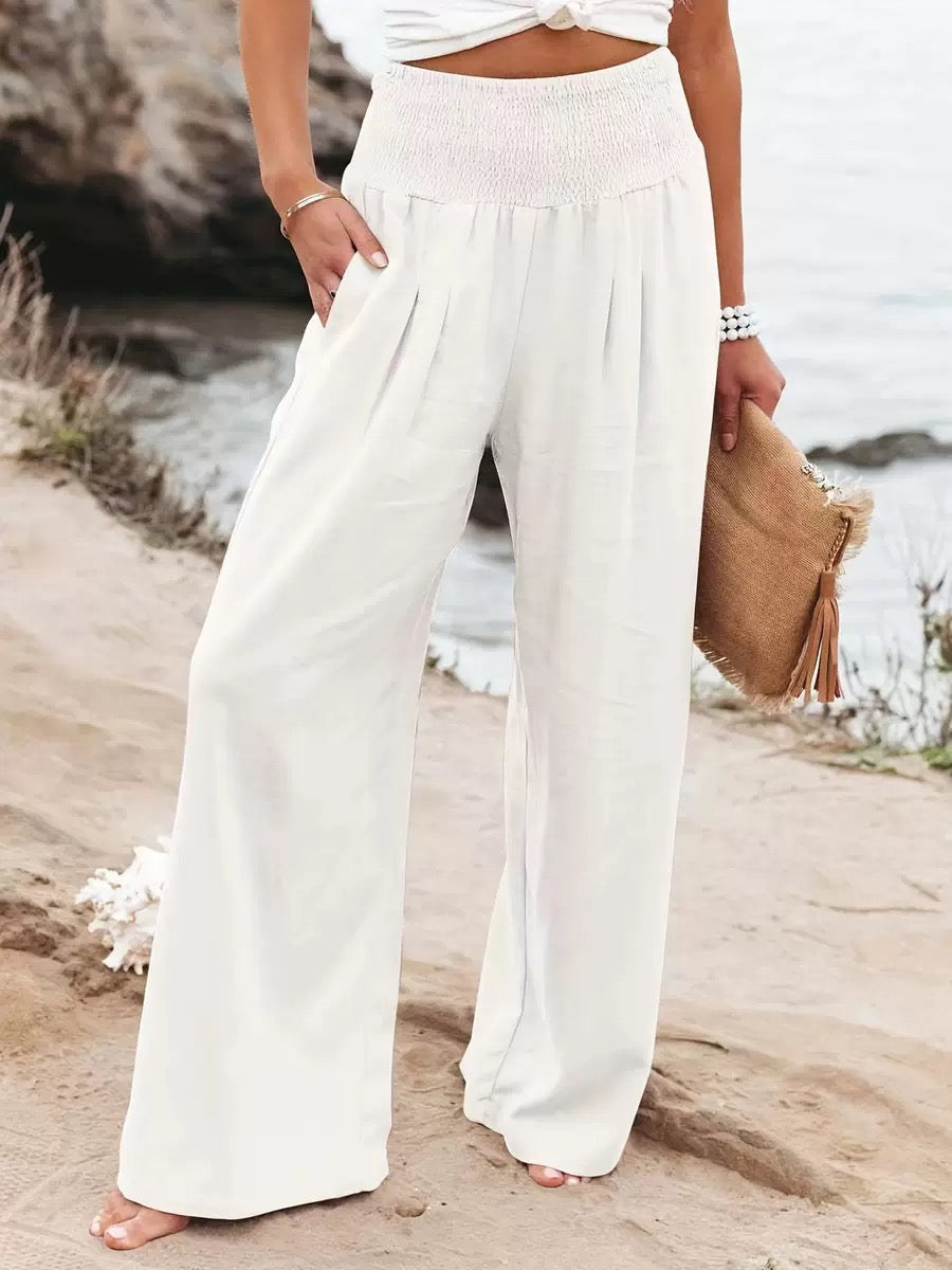 Women's lightweight wide leg linen trousers, perfect for comfortable summer fashion.