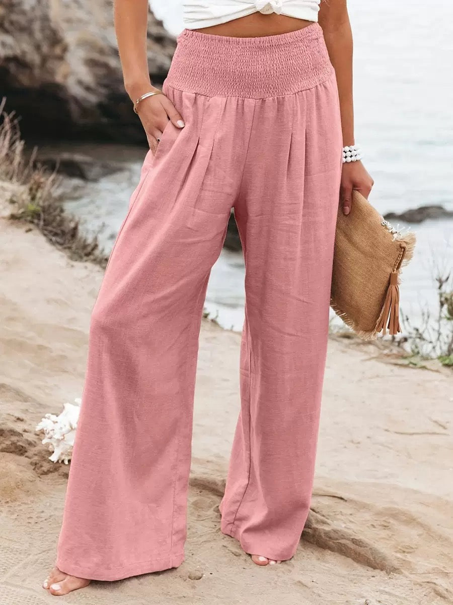 Rolled hem detail on women's casual wide leg linen trousers, adding a stylish touch.