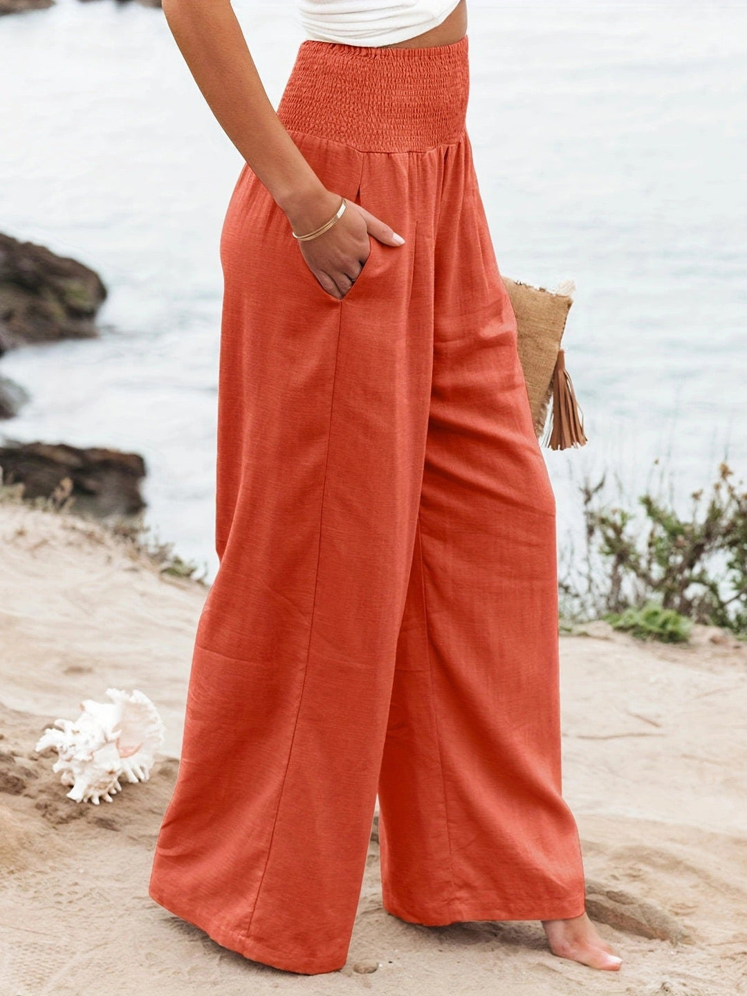 Classic women's wide leg linen trousers, offering timeless summer fashion and breathable comfort.
