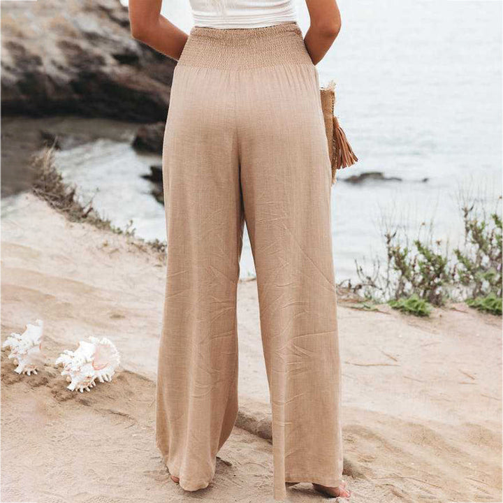 Flowy lightweight wide leg linen trousers for women, designed for ultimate summer breathability.