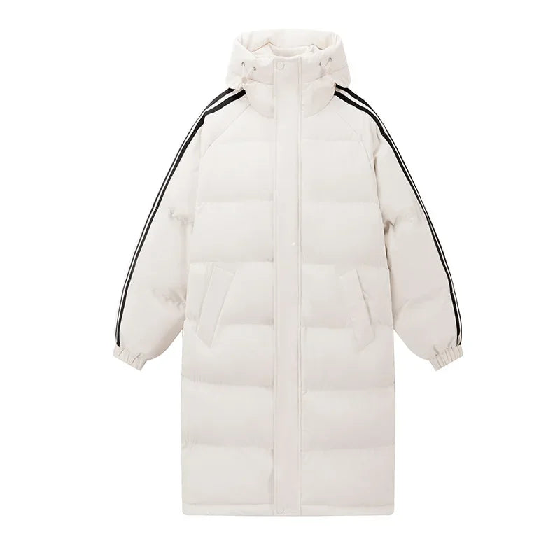 Close-up of the quilted detail on a women's long puffer ski jacket, highlighting its warm design