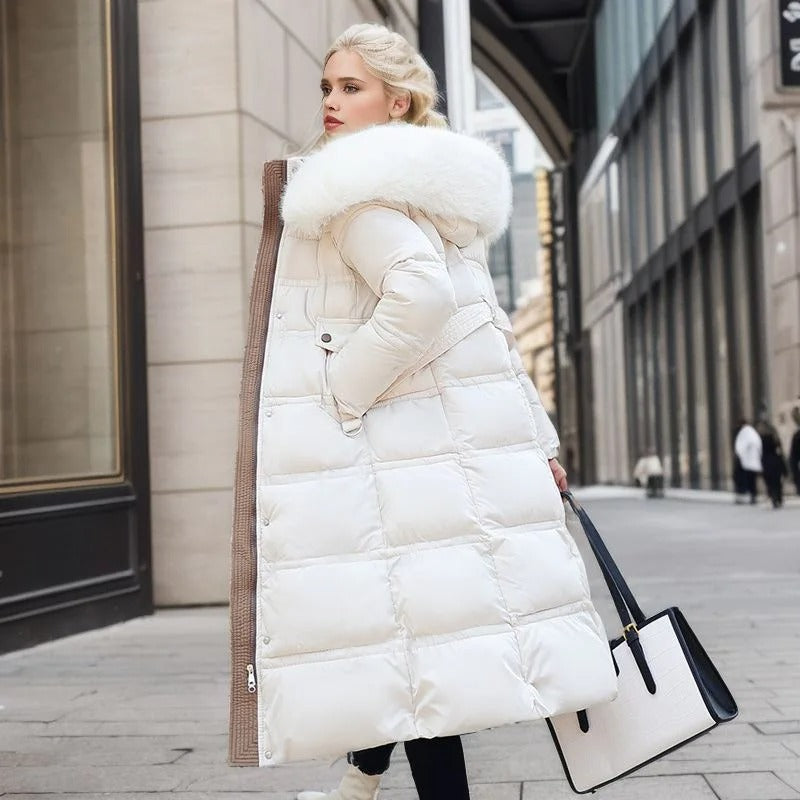 Warm women's long puffer jacket featuring a high collar, designed for ultimate cold weather protection.