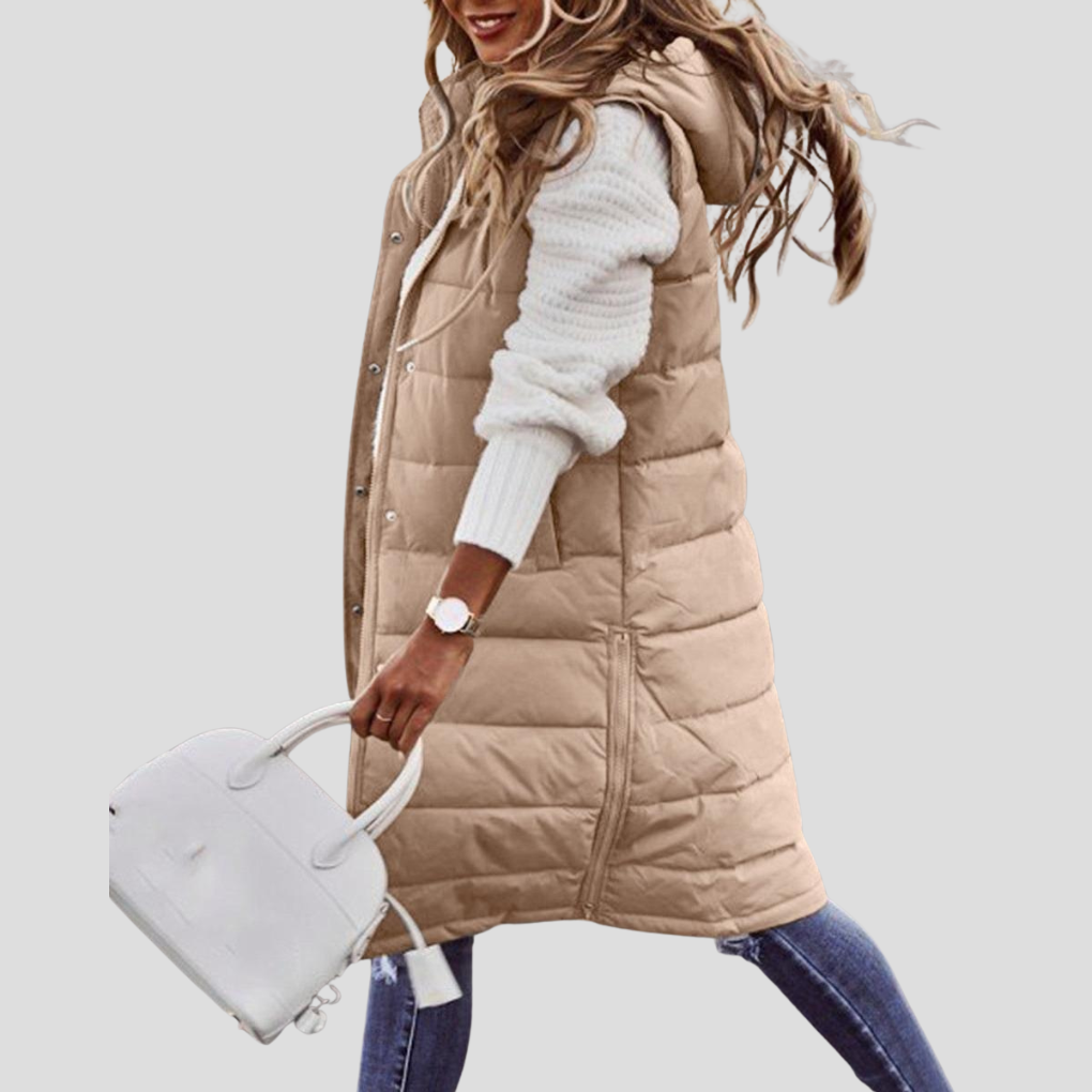 Elegant women's padded bodywarmer with hood, sleeveless design for comfortable layering