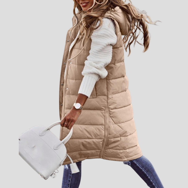Elegant women's padded bodywarmer with hood, sleeveless design for comfortable layering
