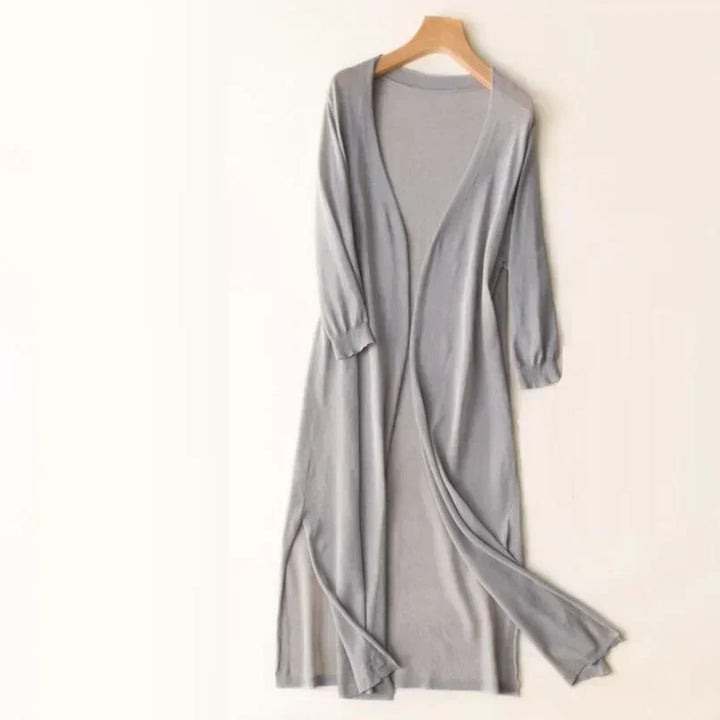 Neutral-toned women's long open front cardigan, a fashion staple for versatile everyday wear.