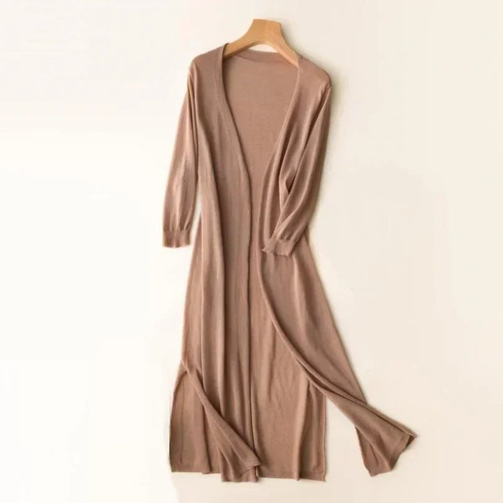 Flowy women's long open front cardigan, showcasing its relaxed fit & stylish layering potential.