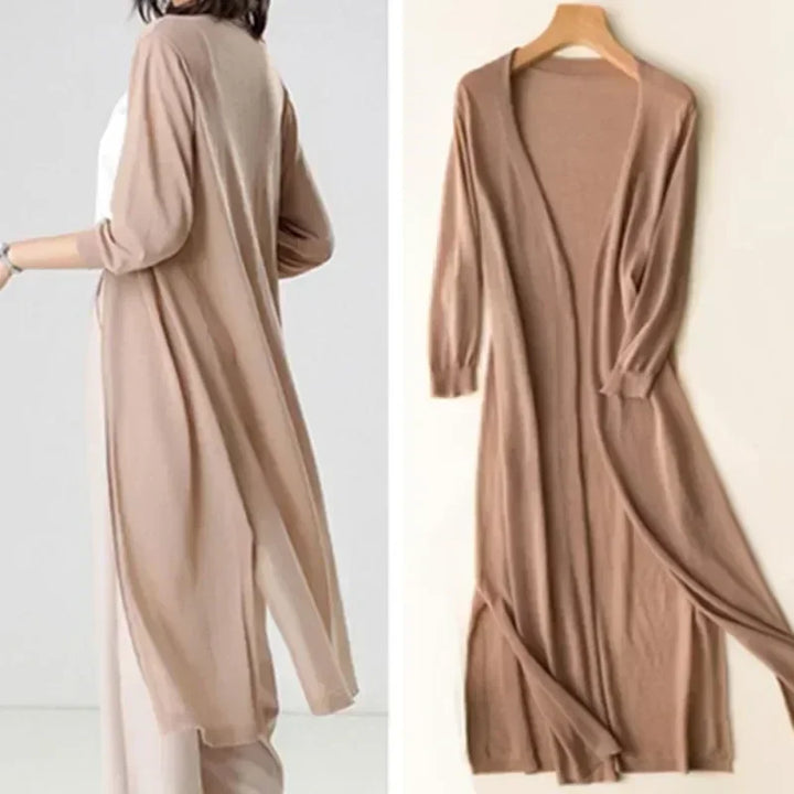 Model wearing a women's long open front cardigan, ideal for seasonal wear & effortless styling.