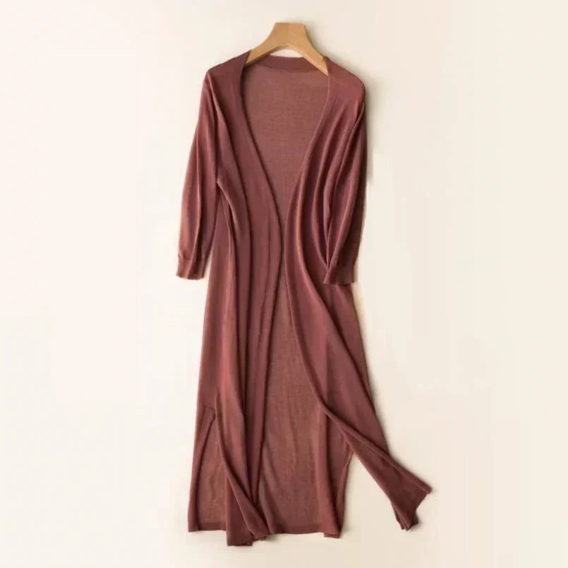 Close-up of the textured fabric on a women's long open front cardigan, emphasizing everyday comfort.