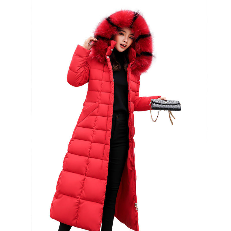 Warm women's long winter parka with a quilted design, hood, and belted waist for stylish comfort.