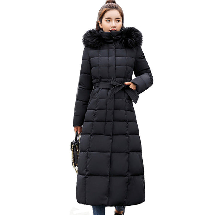 Stylish ladies' long quilted winter coat, featuring a cozy hood and an adjustable belt for fit.