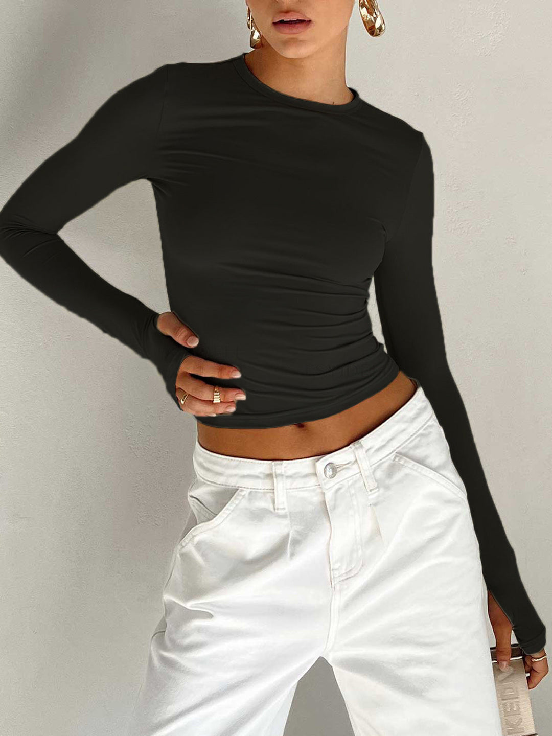 Comfortable women's long sleeve crop top in a vibrant color, great for casual summer styling