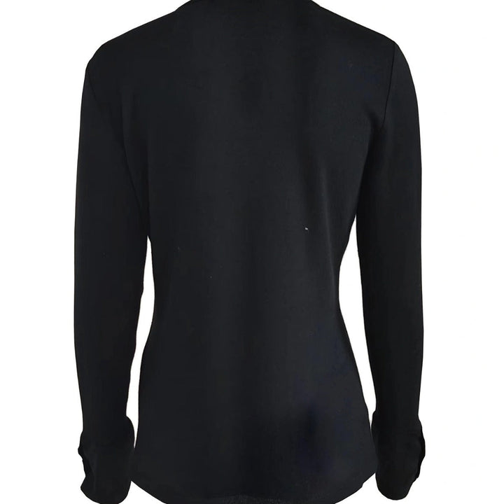 Stylish women's long sleeve V-neck top with button accents, a comfortable and versatile piece for any wardrobe.