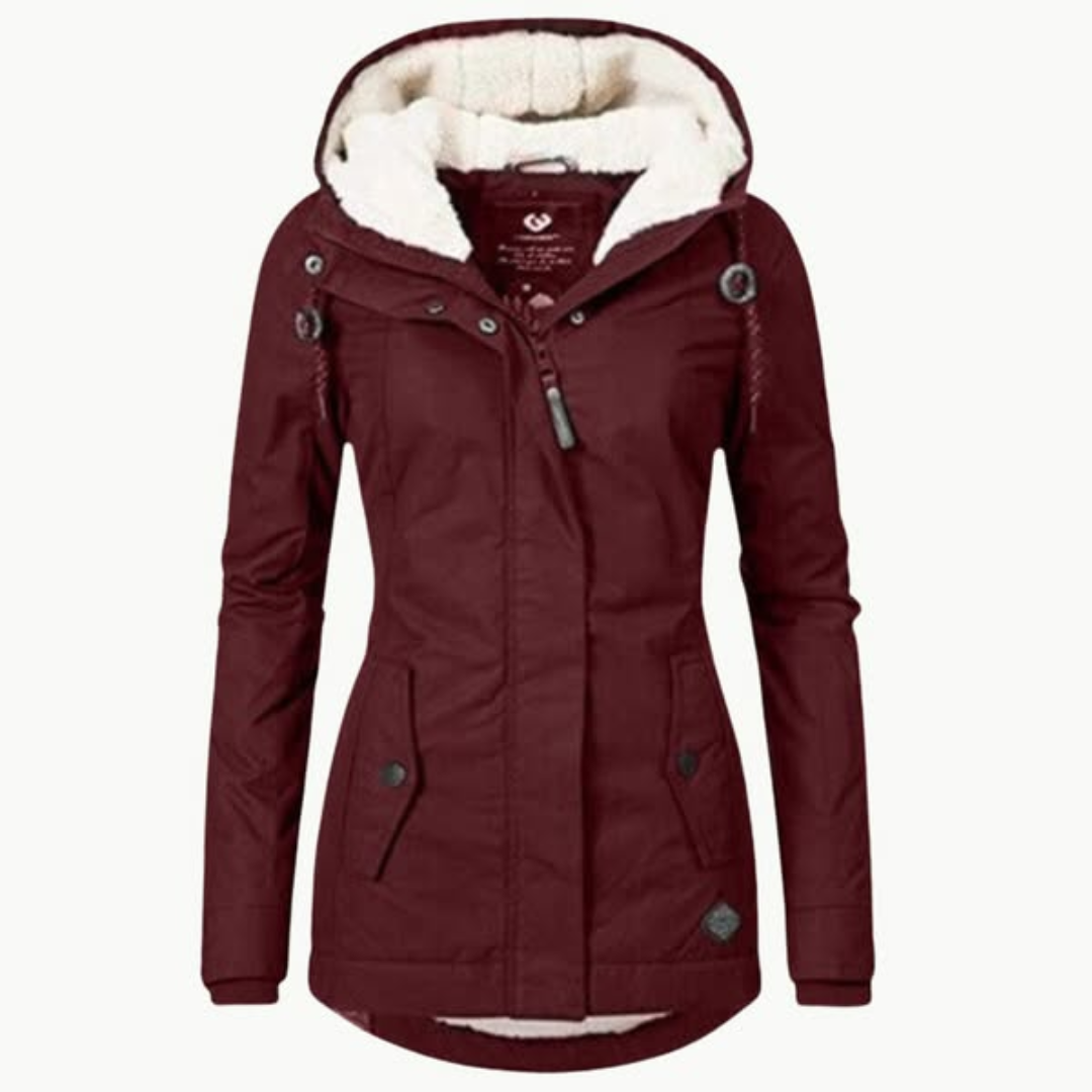 Women's waterproof long winter jacket, stylish and fully fleece-lined for comfort.