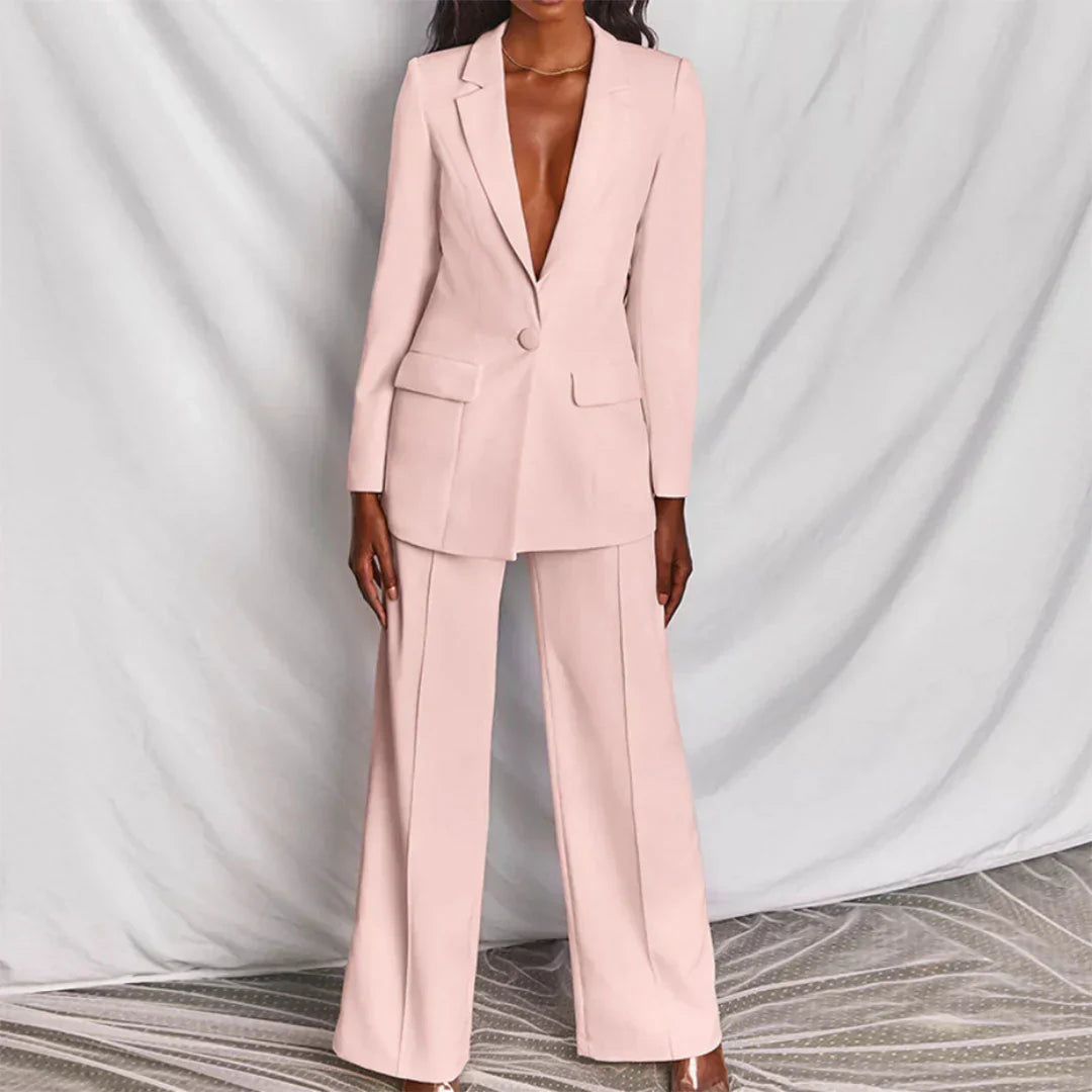 Fashionable women's structured suit set, featuring a smart longline blazer and on-trend wide-leg pants.
