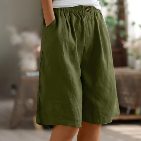 Women's loose fit casual shorts with elastic waist in a light color, perfect for summer comfort.