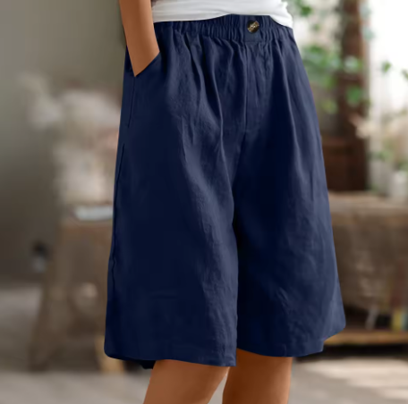 Side profile of women's wide leg casual shorts featuring a flexible elastic waistband.