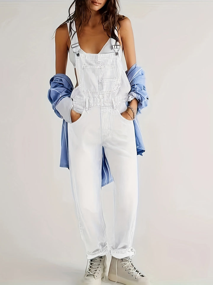 Adjustable straps on women's loose fit denim dungarees for versatile comfort and casual style.