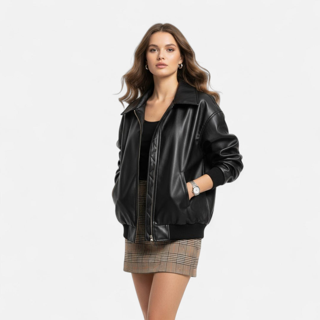 Chic women's loose moto jacket with classic biker details; a stylish and comfortable casual outerwear piece.