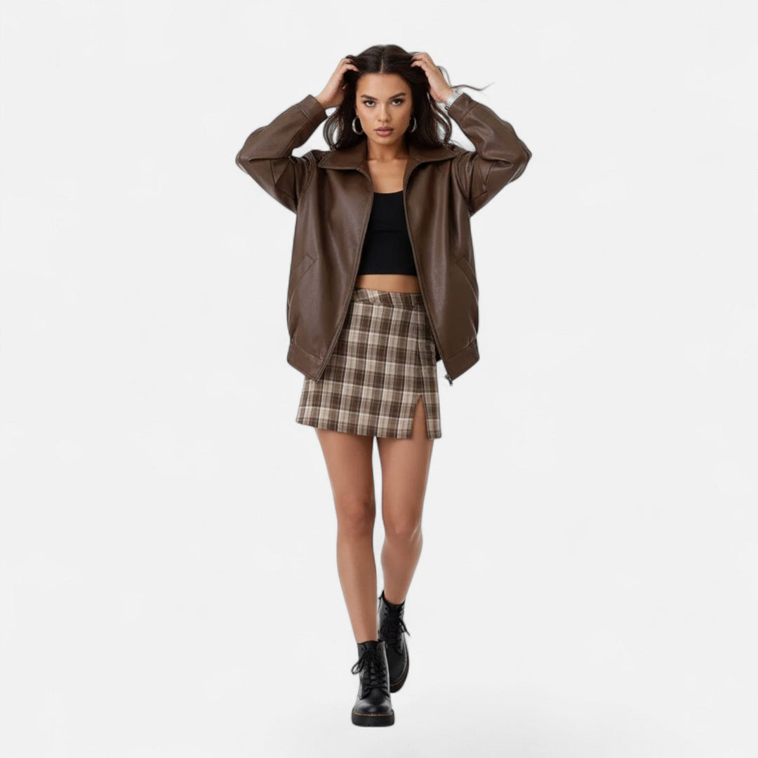 Stylish women's loose-fit moto jacket. A versatile biker outerwear, offering an effortless chic and casual style.