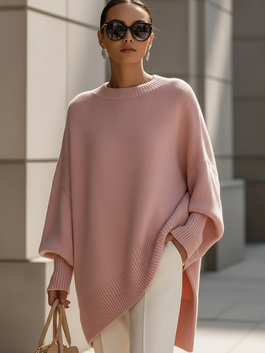 Full shot of a model wearing a loose wool blend knit sweater, stylish and warm for winter fashion