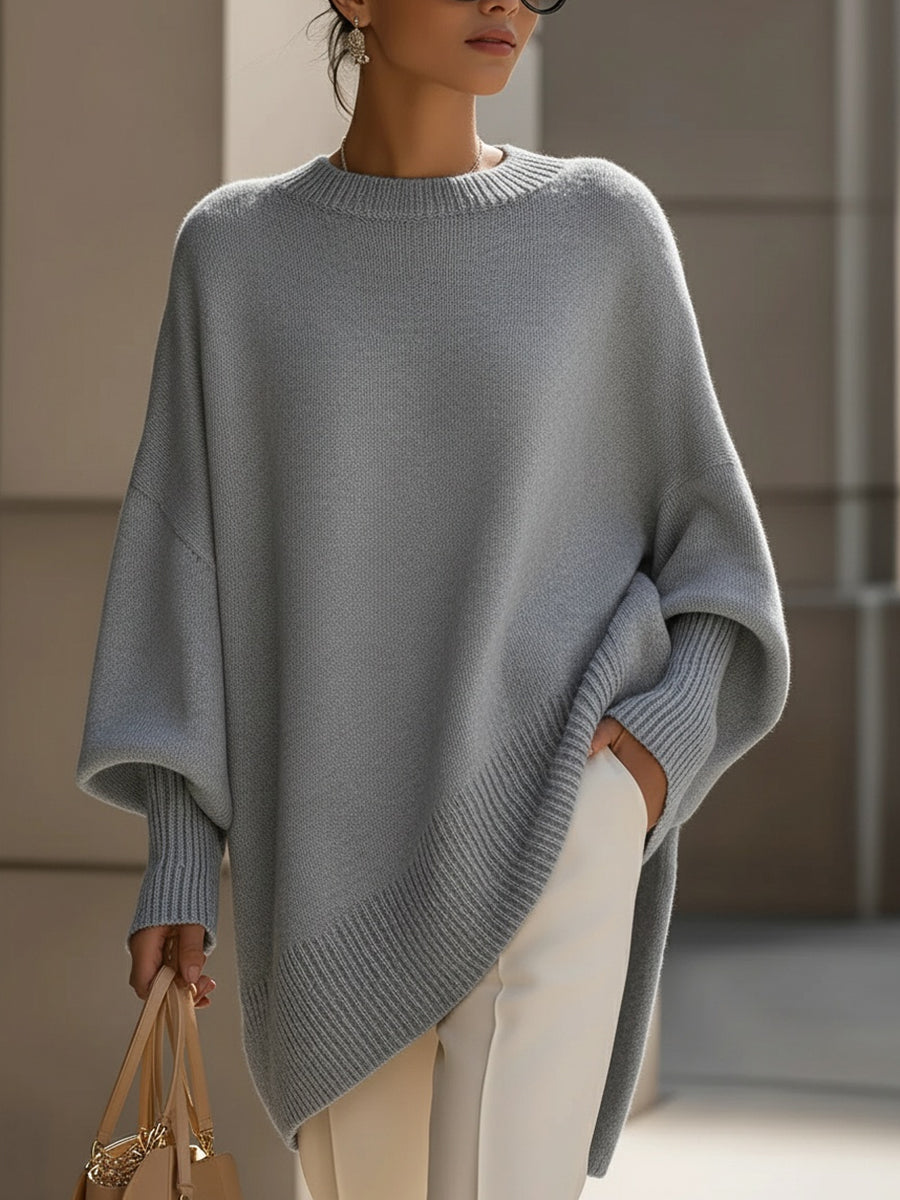 Detail of the comfortable fabric of a women's loose knit wool blend sweater, suitable for fall