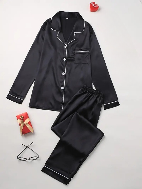 Two-piece women's satin pajama set. Comfortable loungewear with relaxed fit top & pants for luxurious sleep.