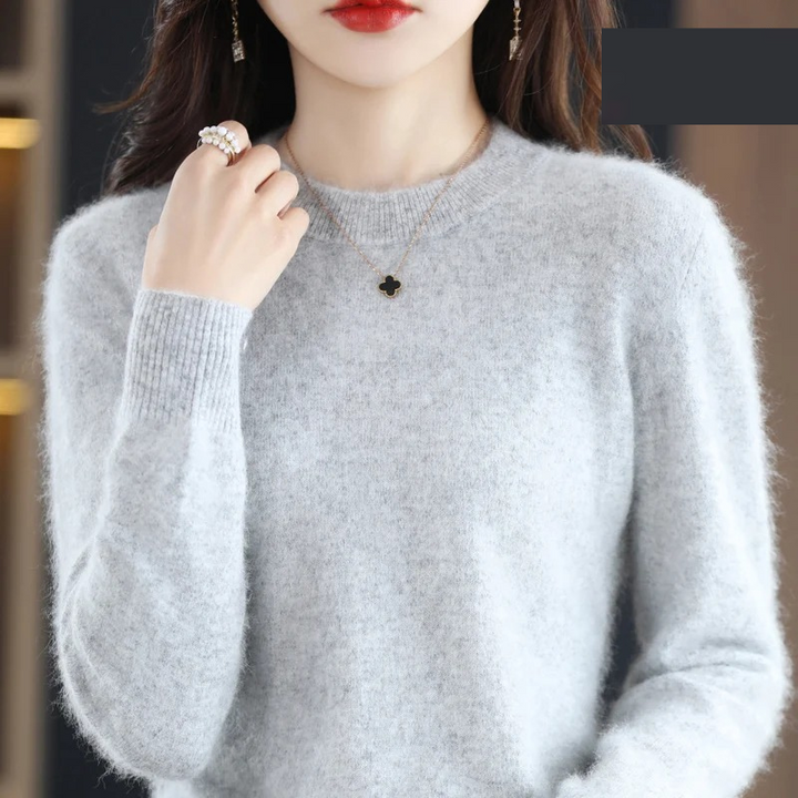 Chic women's round neck pullover, versatile and soft, perfect for elegant spring & autumn wear.