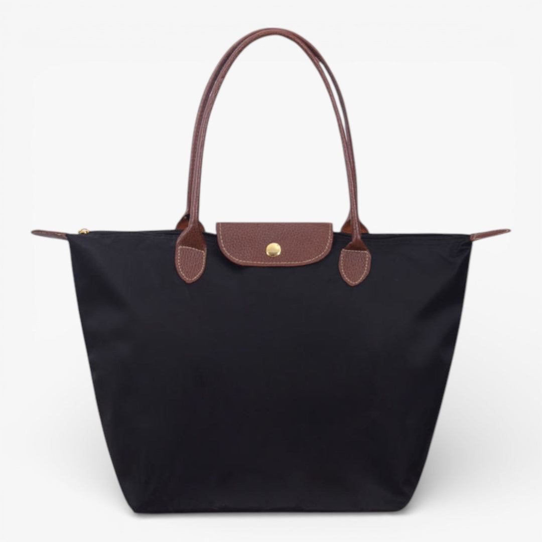 Women's luxury shoulder handbag with zip closure. Spacious, stylish design for everyday fashion.