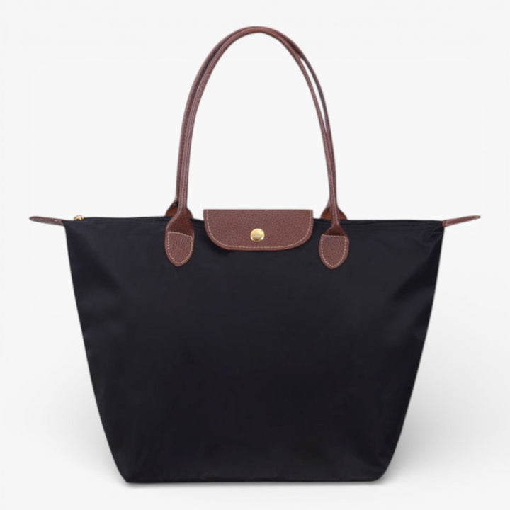Women's luxury shoulder handbag with zip closure. Spacious, stylish design for everyday fashion.