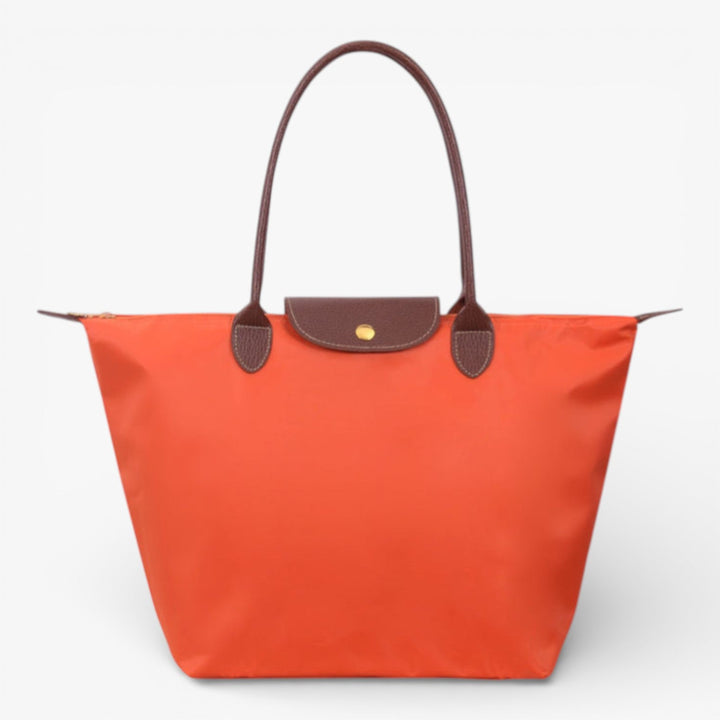 Interior view of spacious women's luxury shoulder bag. Multi-pocket design, secure zip for organization.