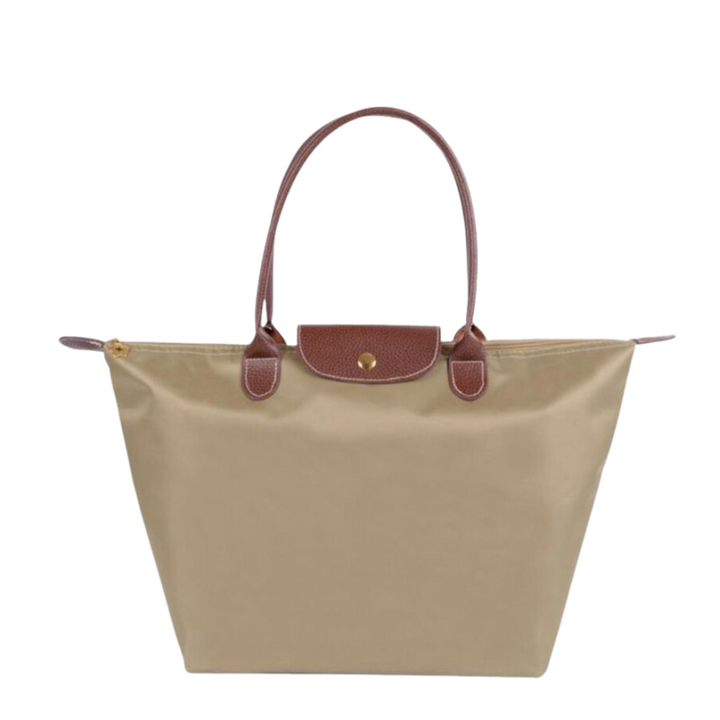Spacious women's luxury shoulder handbag. Organized multi-pocket design with secure zip closure.