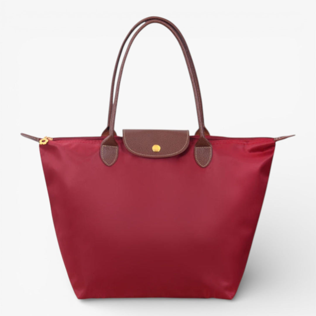 Versatile women's luxury shoulder bag. Spacious, stylish, and secure with zip for everyday use.
