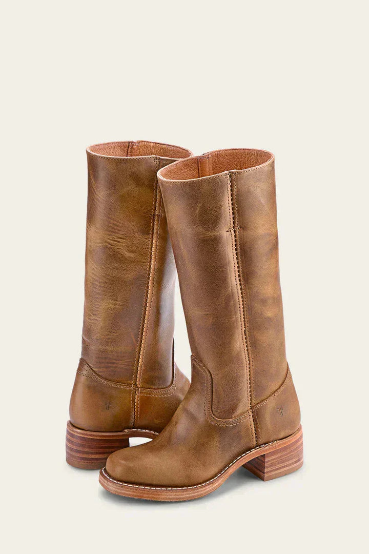 Elegant black mid-calf boots for women, featuring a block heel & chic closed toe design.