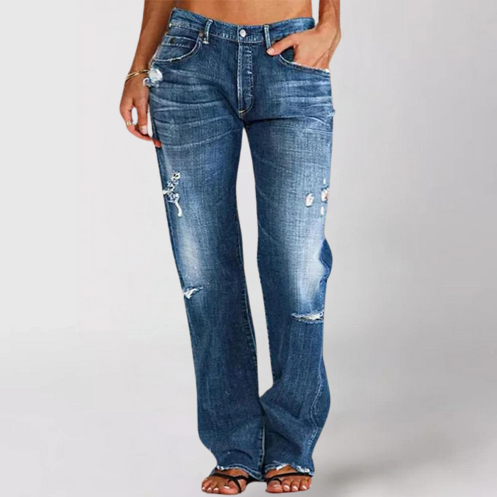 Stylish women's mid-rise straight leg distressed jeans, perfect for everyday fashion