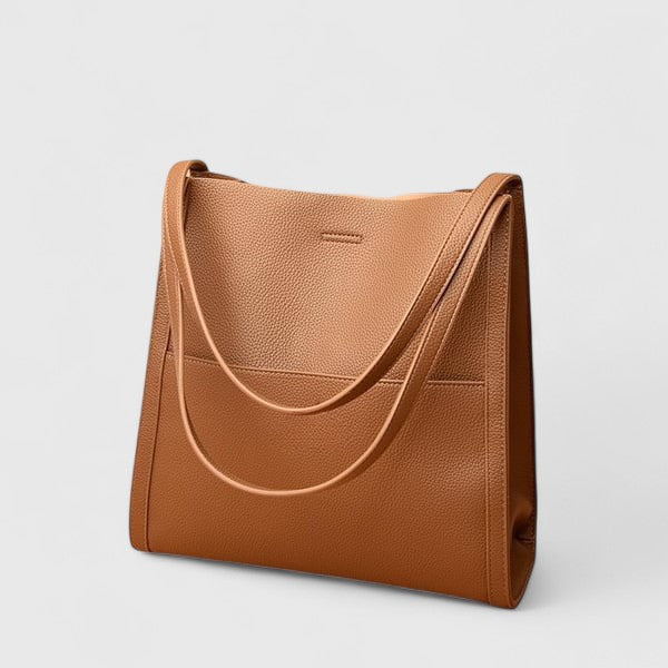 Elegant women's classic shoulder bag, versatile for crossbody wear, a timeless fashion accessory.