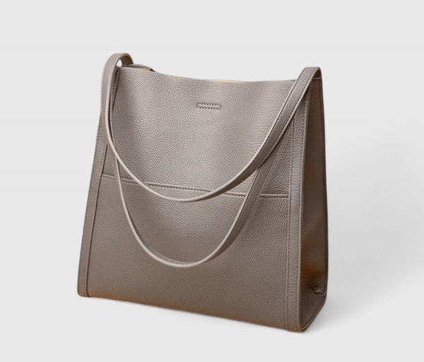 Stylish women's black classic shoulder bag, a must-have minimalist accessory for any outfit.