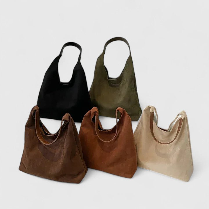 Women's minimalist everyday shoulder bag in an elegant, versatile design for daily use.