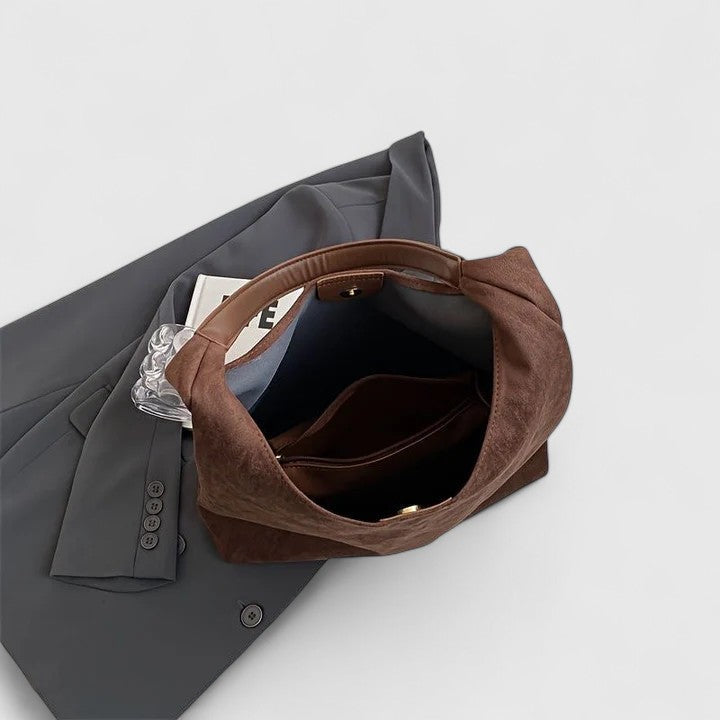 Fashion accessory: women's minimalist shoulder bag with a clean, modern aesthetic.