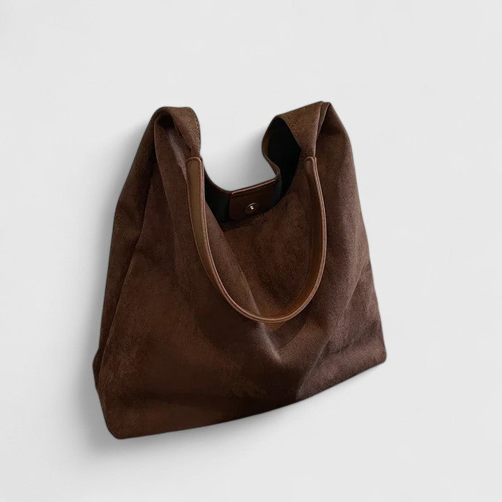 Sophisticated women's minimalist handbag, great for any casual or everyday look.