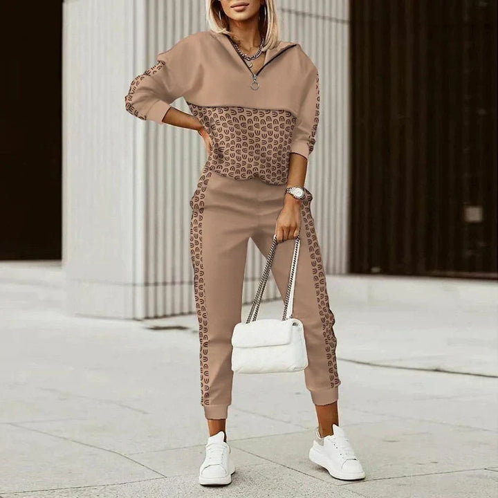 Women's modern casual tracksuit with zipper top, ideal for loungewear or light sportswear.