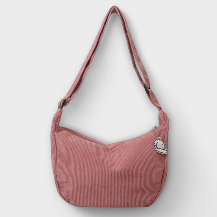 Women's modern elegant curved shoulder bag in black, a chic fashion accessory for everyday use