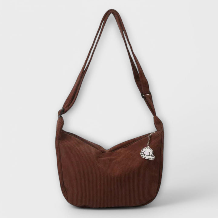 Sophisticated women's modern curved shoulder bag, an essential elegant fashion accessory