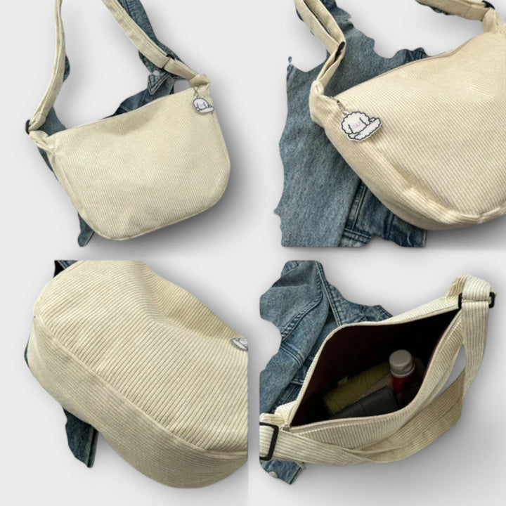 Women's modern shoulder bag with a unique curved silhouette, suitable for all occasions