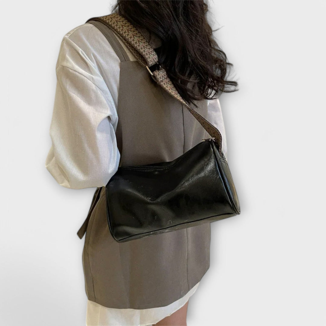 Casual women's shoulder bag with a unique patterned strap, perfect for daily use.